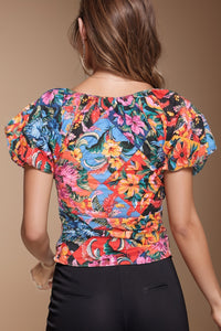 Thumbnail for Ruched Printed V-Neck Short Sleeve Blouse
