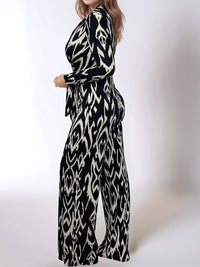 Thumbnail for Full Size Leopard Tie Waist Long Sleeve Jumpsuit Plus Size