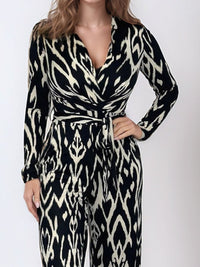 Thumbnail for Full Size Leopard Tie Waist Long Sleeve Jumpsuit Plus Size