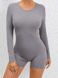 Thumbnail for Cutout Round Neck Long Sleeve Active Romper