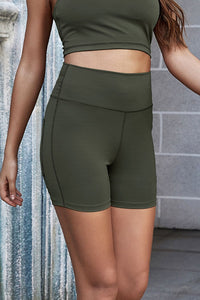 Thumbnail for Exposed Seam Decorative Button Yoga Shorts